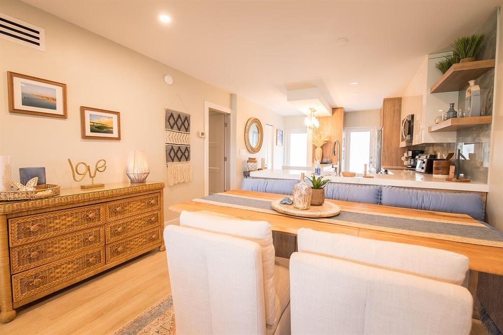 A row of white hotel room doors with a welcome mat along an outdoor walkway — 101 NE 19th Avenue # 126, Deerfield Beach FL 33441, DEERFIELD BEACH, FL