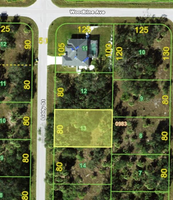 This is a satellite map view showing a rectangular vacant lot highlighted in yellow — 414 LIDDY STREET, PORT CHARLOTTE, FL