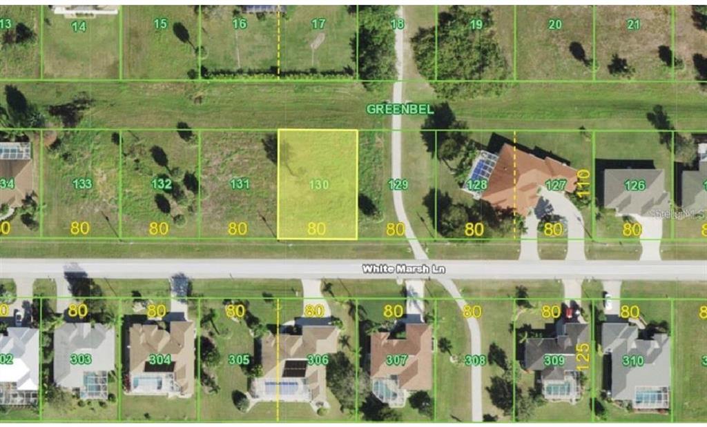 This is an aerial map showing a vacant residential lot highlighted in yellow on White Marsh Lane — 113 WHITE MARSH LANE, ROTONDA WEST, FL