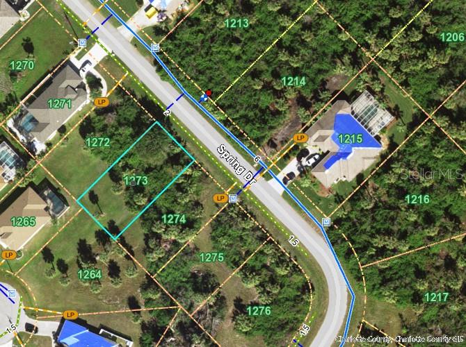 This is an aerial map showing residential lots and a street named Spring Dr — 125 SPRING DRIVE, ROTONDA WEST, FL