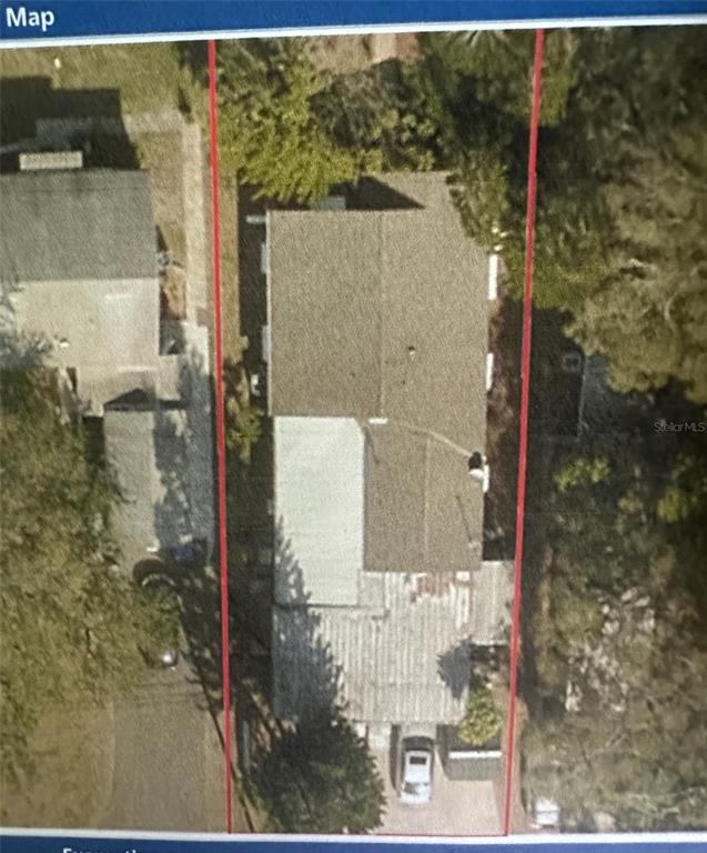 This is an aerial map view showing a residential property with a house and driveway — 5234 9TH AVENUE N, ST PETERSBURG, FL