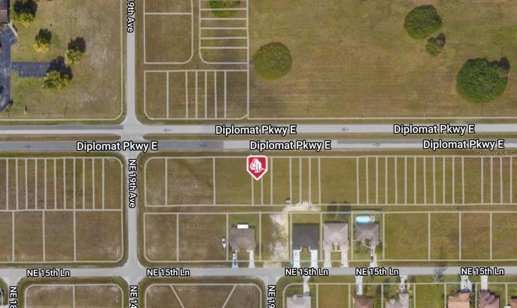 This is an aerial map showing residential lots along Diplomat Pkwy E and NE 15th Ln — 1936 DIPLOMAT PARKWAY E, CAPE CORAL, FL