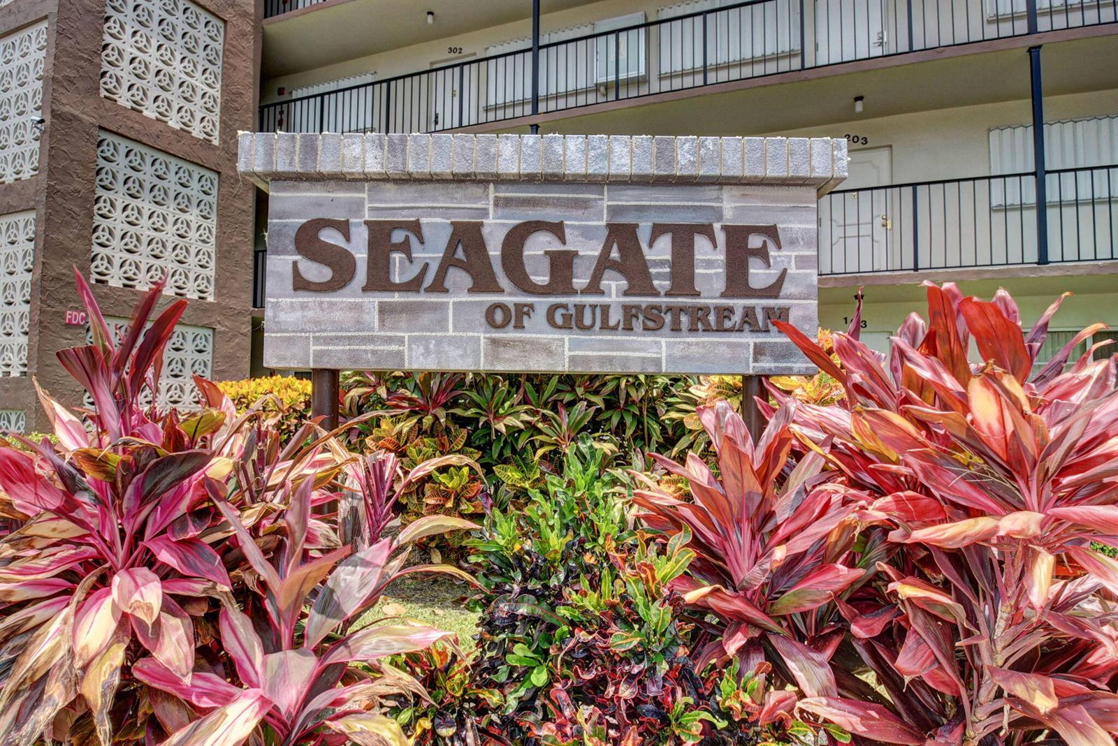 A stone sign for Seagate of Gulfstream stands in front of a multi-story apartment building — 2010 S Federal Highway # 202, Boynton Beach FL 33435, BOYNTON BEACH, FL