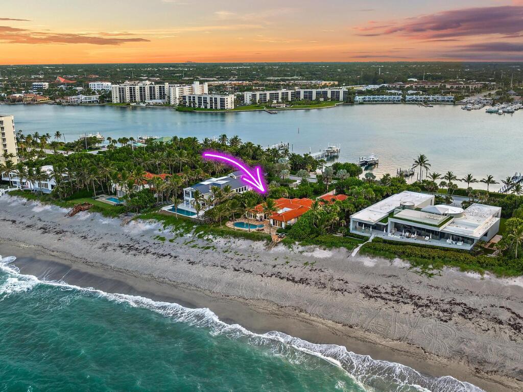 An aerial view of a beachfront property with a red-tiled roof and swimming pool — 613 S Beach Road, Jupiter FL 33469, JUPITER, FL