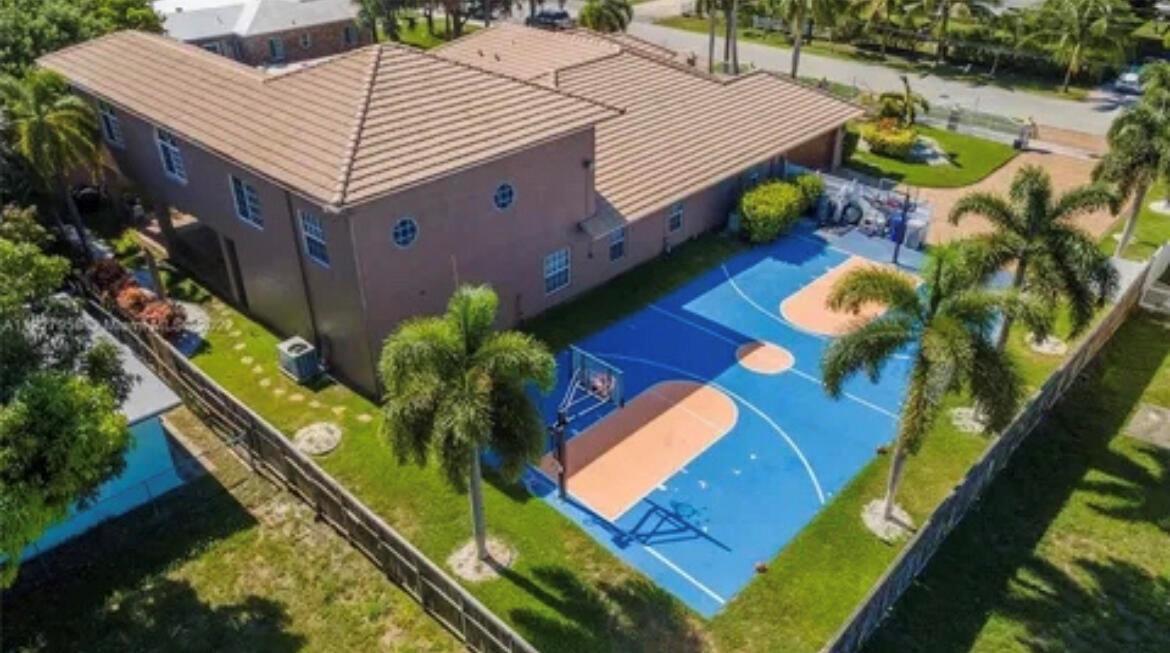 An aerial view of a house with a private blue and orange basketball court — 423 NE 3rd Street, Pompano Beach FL 33060, POMPANO BEACH, FL