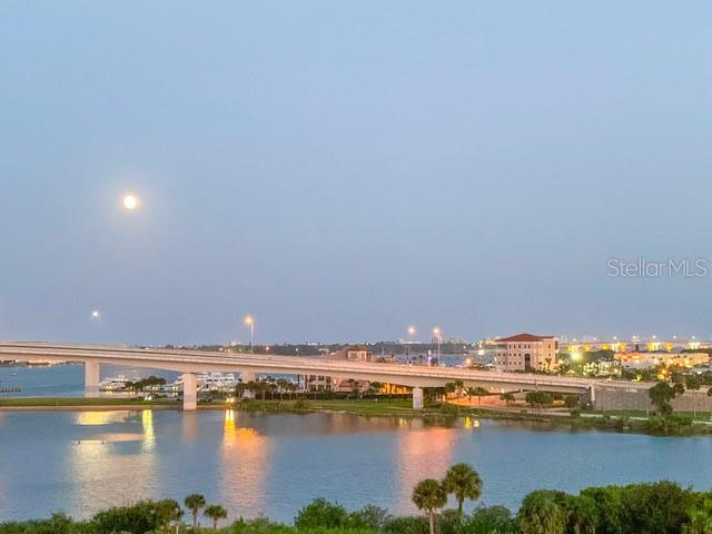 An elevated view of a bridge spanning a body of water under a full moon — 231 RIVERSIDE DRIVE UNIT 709-1, DAYTONA BEACH, FL