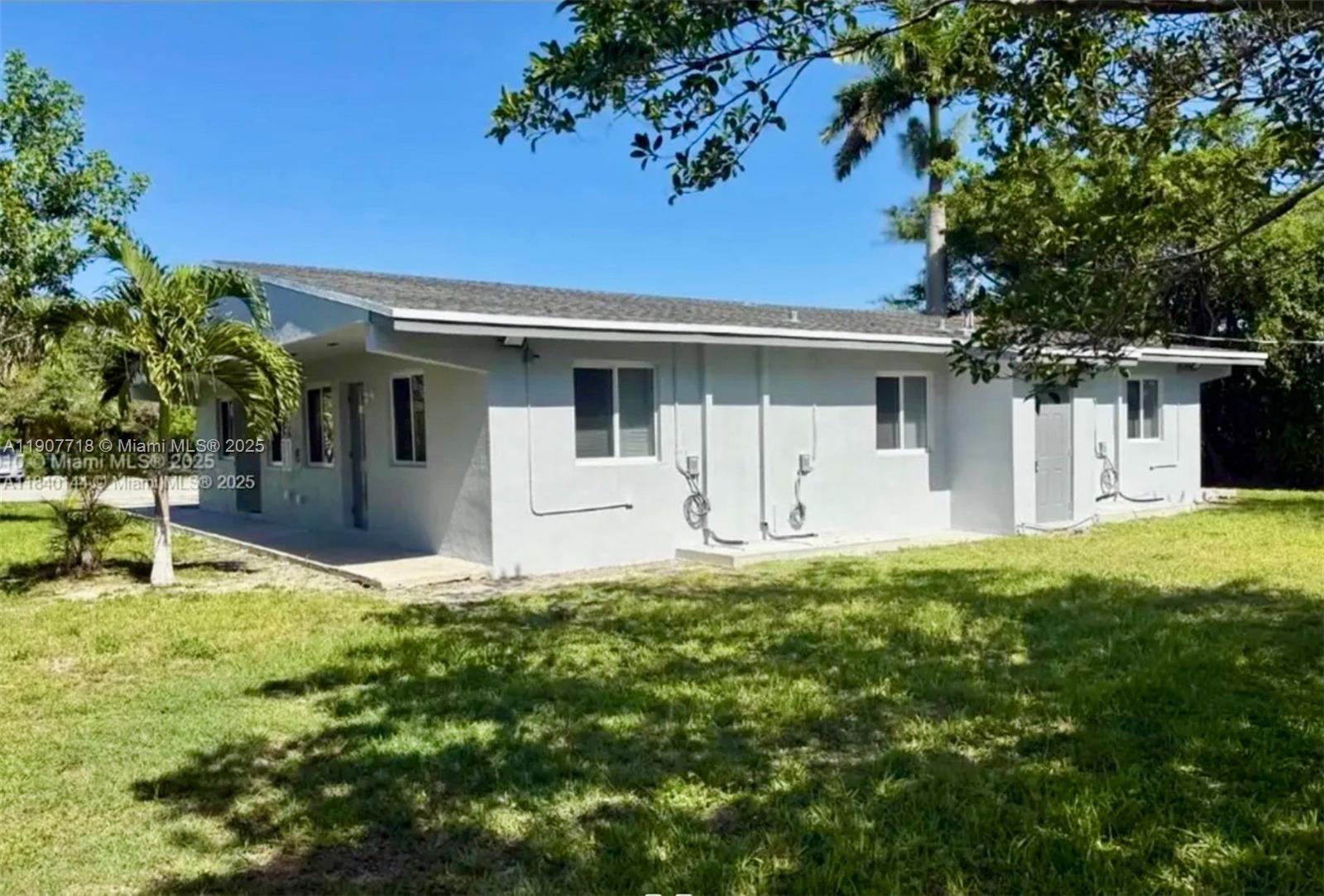 A single-story house with light gray exterior walls and a dark shingled roof — 22210 SW 116th Ave # D, Miami FL 33170, MIAMI, FL