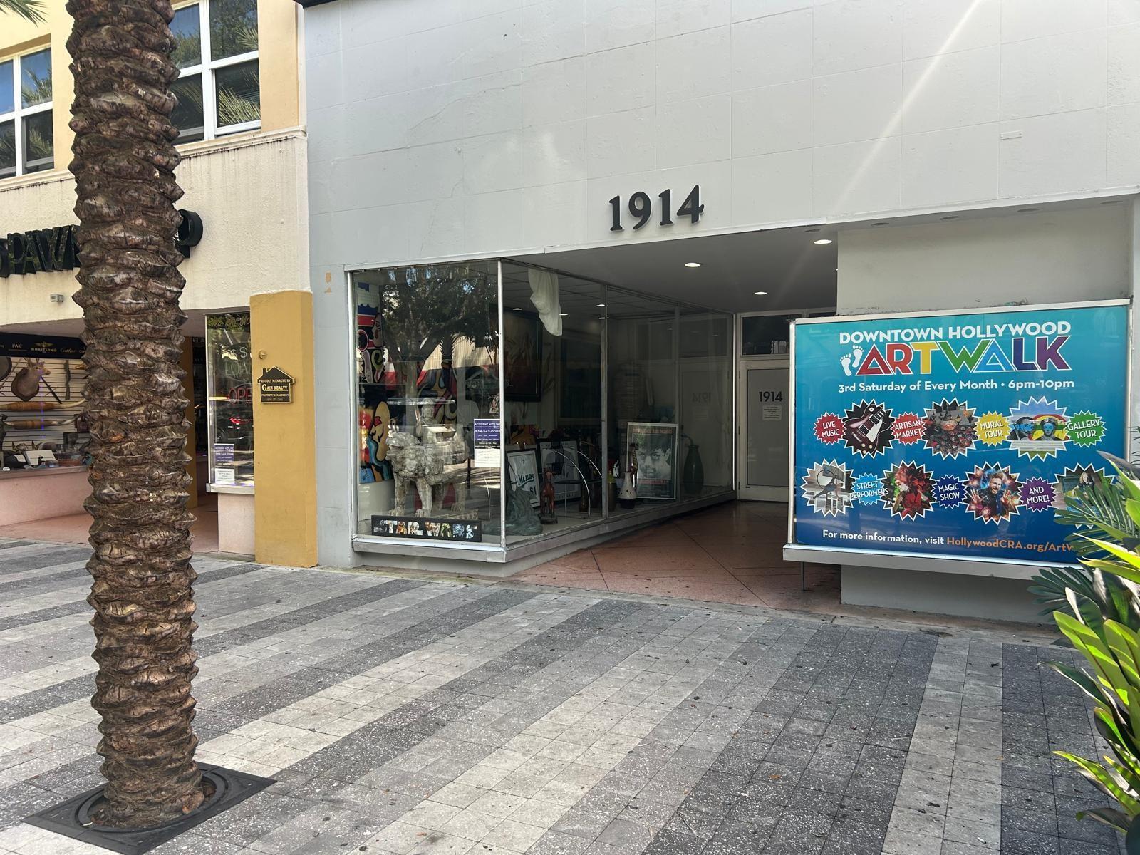 A storefront entrance with a large display window and a Downtown Hollywood ArtWalk sign — 1914 Hollywood Boulevard, Hollywood FL 33020, HOLLYWOOD, FL