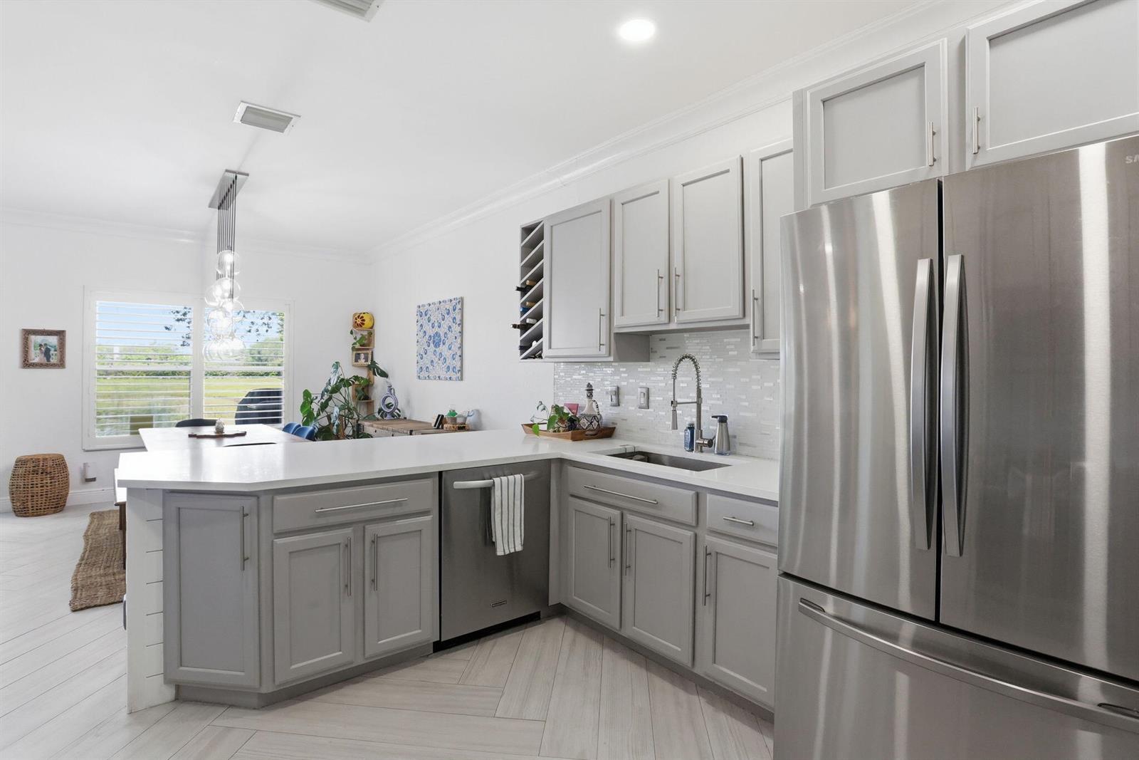 4103 Bamboo Palm Court, FL 33463