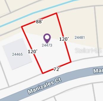 This is a map showing the property lines and dimensions of a residential lot — 24473 MANIZALES COURT, PUNTA GORDA, FL