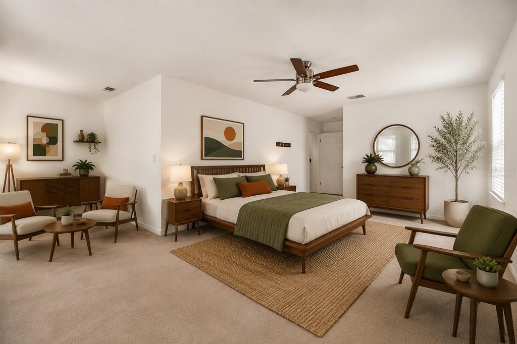 A bedroom features a wooden bed frame, mid-century modern furniture, and a neutral color palette — 6105 MERRIFIELD DRIVE, ZEPHYRHILLS, FL