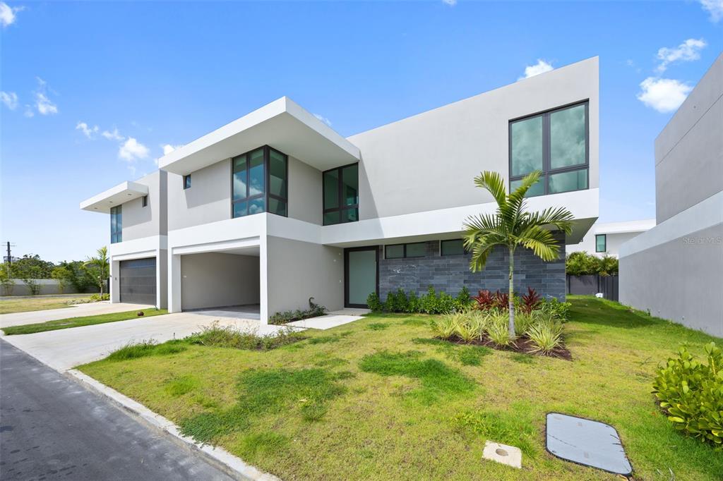 A modern two-story house with a flat roof, gray exterior, and an attached garage — RIVIERA PARKVIEW 135 SALONGA STREET, BAYAMON, PR
