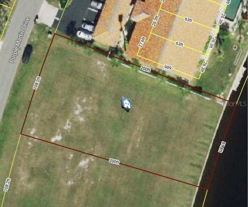 This is an aerial map showing a rectangular vacant lot with property dimensions — 3232 PURPLE MARTIN DRIVE, PUNTA GORDA, FL