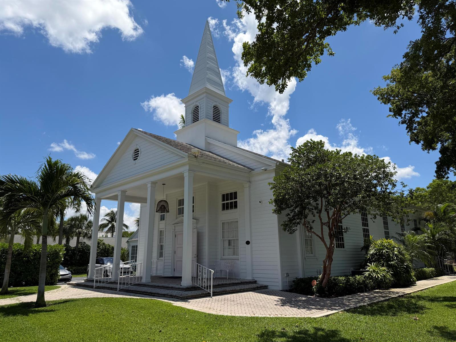 A white wooden church with a steeple and a front porch stands on a lawn — 200 SE 7th Avenue, Delray Beach FL 33483, DELRAY BEACH, FL