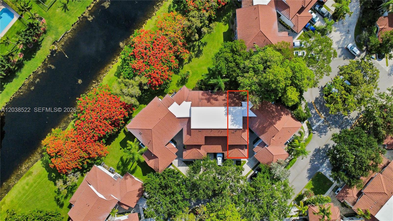 An aerial view shows a residential building with a red tile roof and a white section — 9237 NW 9th Pl # 9257, Plantation FL 33324, PLANTATION, FL