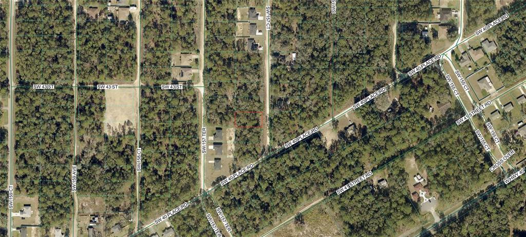 This is an aerial map showing a vacant lot outlined in red within a wooded area — 0 SW 157TH COURT, OCALA, FL