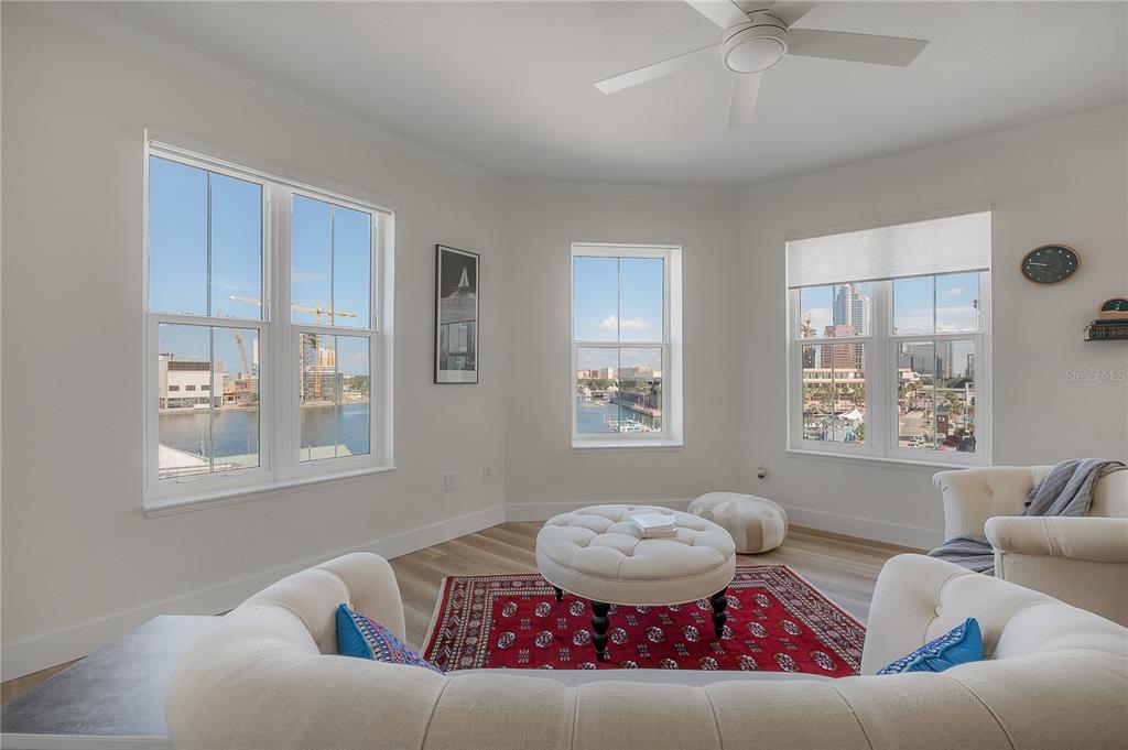 A view of a city skyline, bridge, and marina seen through a window — 700 S HARBOUR ISLAND BOULEVARD UNIT 713, TAMPA, FL