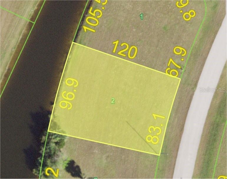 This is a satellite map view of a vacant residential lot with property boundary dimensions — 17475 BELIE WAY, PUNTA GORDA, FL