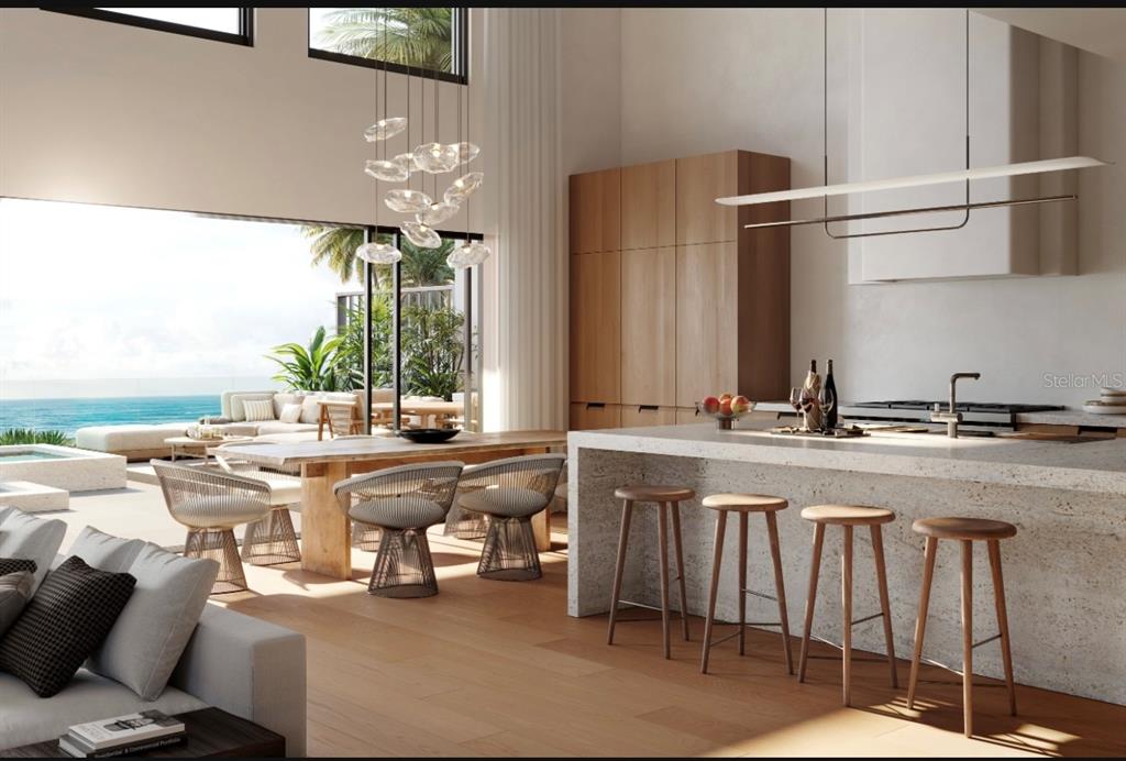 This rendering shows an open-concept kitchen and dining area with ocean views and modern furniture — 6645 N OCEAN SHORE BOULEVARD UNIT 6B, PALM COAST, FL