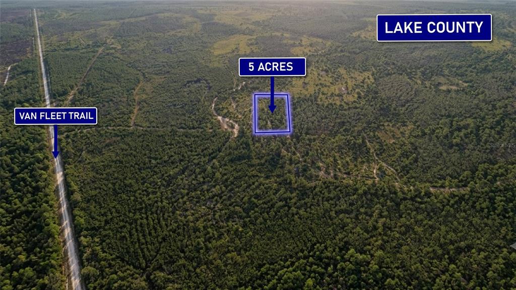 An aerial view shows a rectangular five-acre plot of land near the Van Fleet Trail — 0000 CALVIN LEE ROAD, CLERMONT, FL