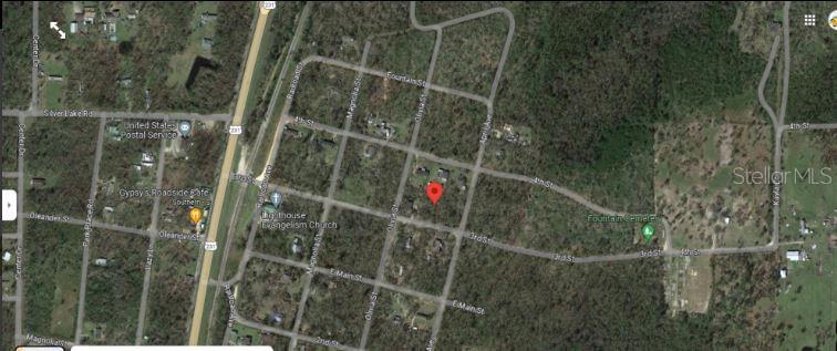 This is an aerial map view showing a residential area with a red location pin — 3RD STREET, FOUNTAIN, FL