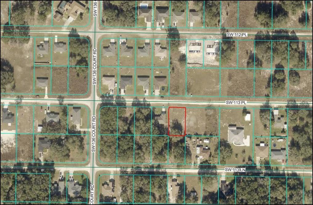 This is an aerial map showing a vacant lot outlined in red within a residential neighborhood — Lot 5 SW 113 PLACE, DUNNELLON, FL