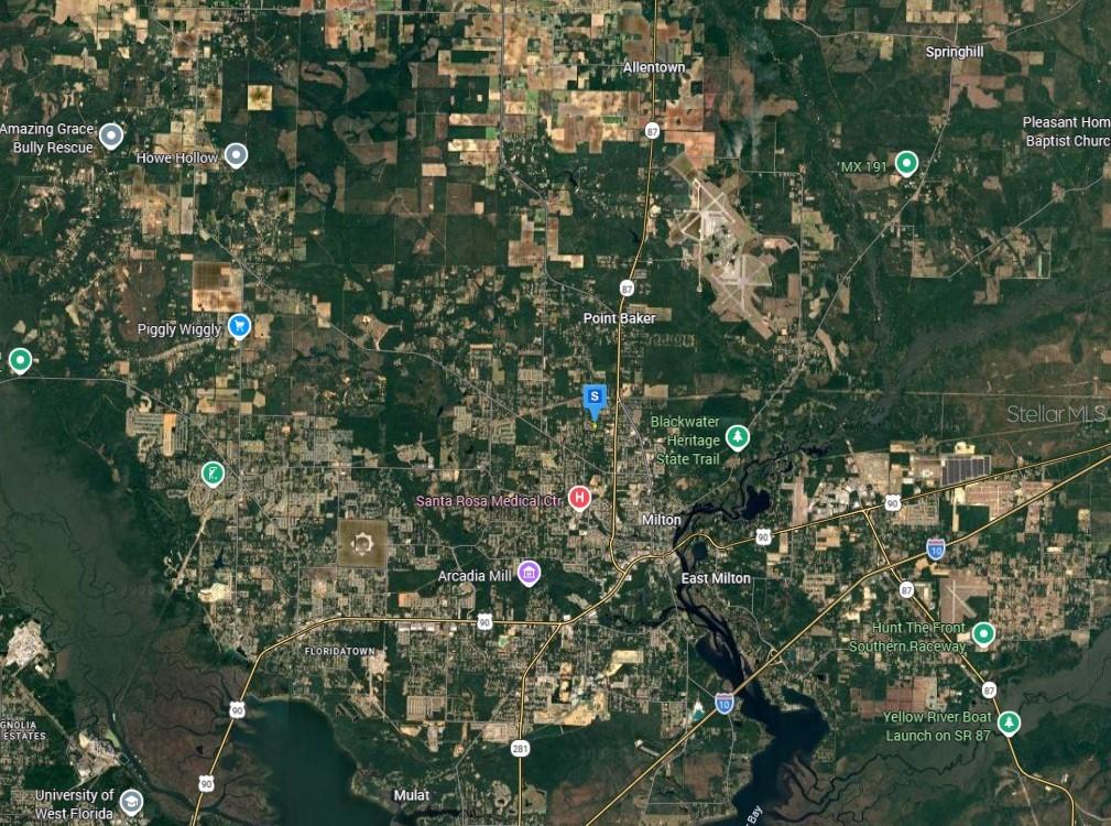 This is a satellite map view of the Milton, Florida area showing roads and landmarks — 6195 KIRBY STREET, MILTON, FL