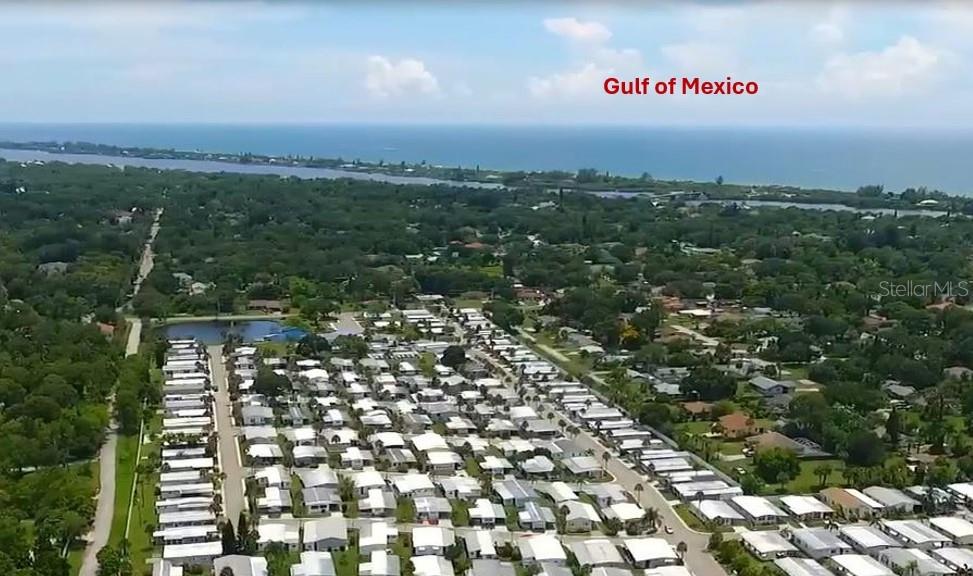 An aerial view shows a mobile home community located near the Gulf of Mexico — 670 DELPHINIUM DRIVE, VENICE, FL