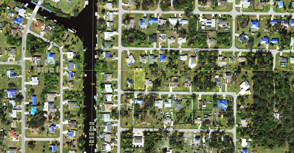 This is an aerial map showing a vacant residential lot highlighted in a suburban neighborhood — 1196 VIRGO DRIVE, PORT CHARLOTTE, FL
