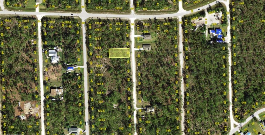This is an aerial map showing a highlighted rectangular plot of land in a subdivision — 12291 HINDLE AVENUE, PUNTA GORDA, FL