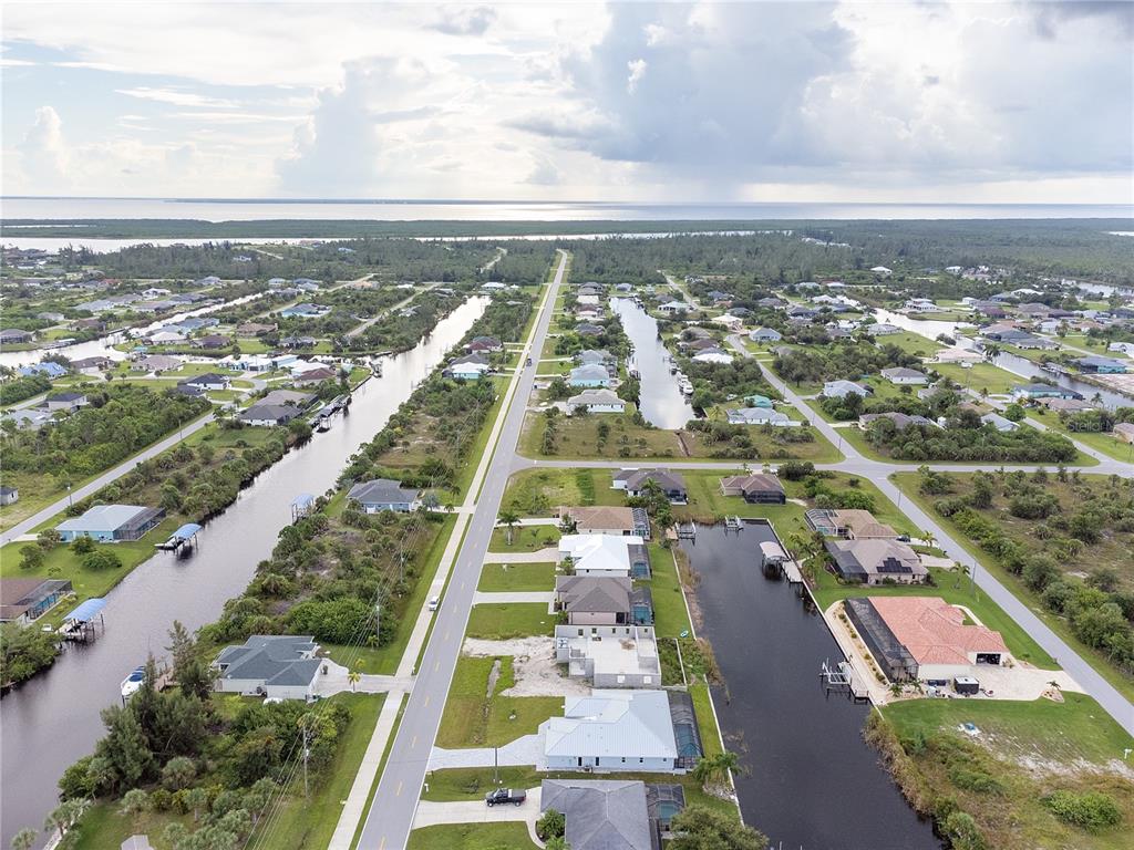 This is a floor plan of a single-story house with a garage, pool, and patio — 15267 APPLETON BOULEVARD, PORT CHARLOTTE, FL