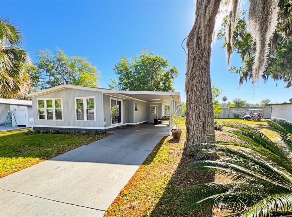 108 N TIMBER TRAIL, WILDWOOD, FL — photo 2 of 24
