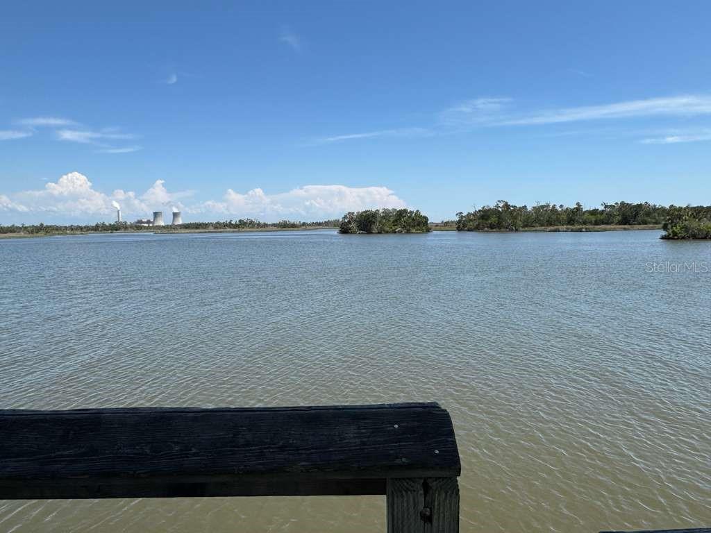 A view of a calm body of water with distant islands and a power plant — 1635 W CITRUS SPRINGS BOULEVARD, CITRUS SPRINGS, FL