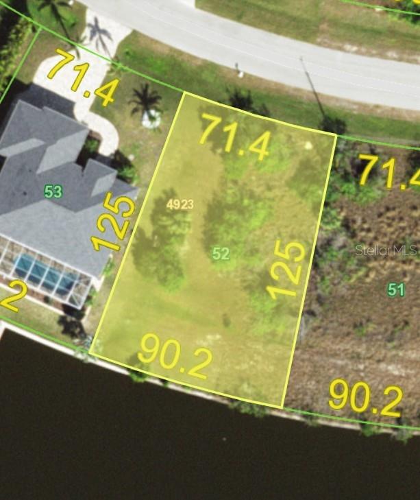 This is an aerial map showing a vacant residential lot with its dimensions highlighted — 15340 ACORN CIRCLE, PORT CHARLOTTE, FL