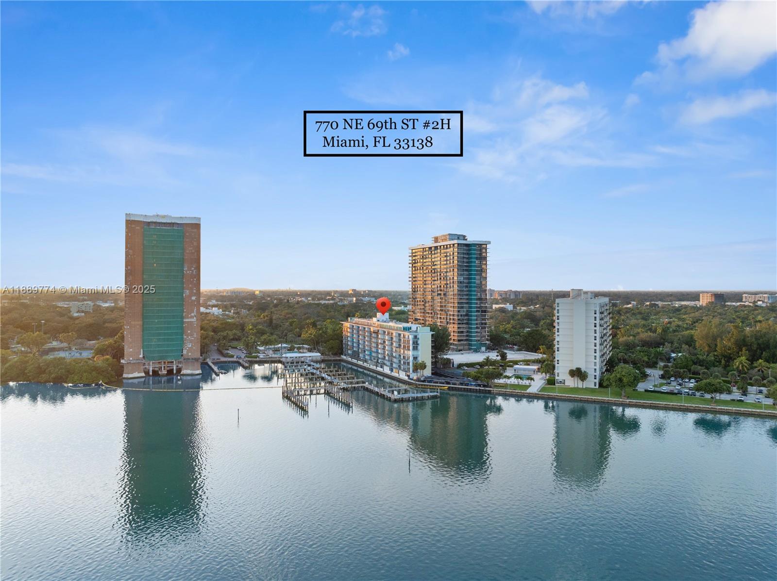 An aerial view shows a waterfront apartment building marked with a red pin — 770 NE 69th St # 2H, Miami FL 33138, MIAMI, FL