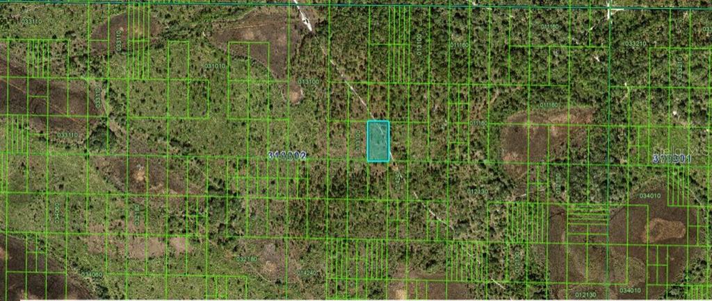 This is a satellite map view showing a highlighted rectangular land parcel among surrounding lots — KICCO ROAD, FROSTPROOF, FL