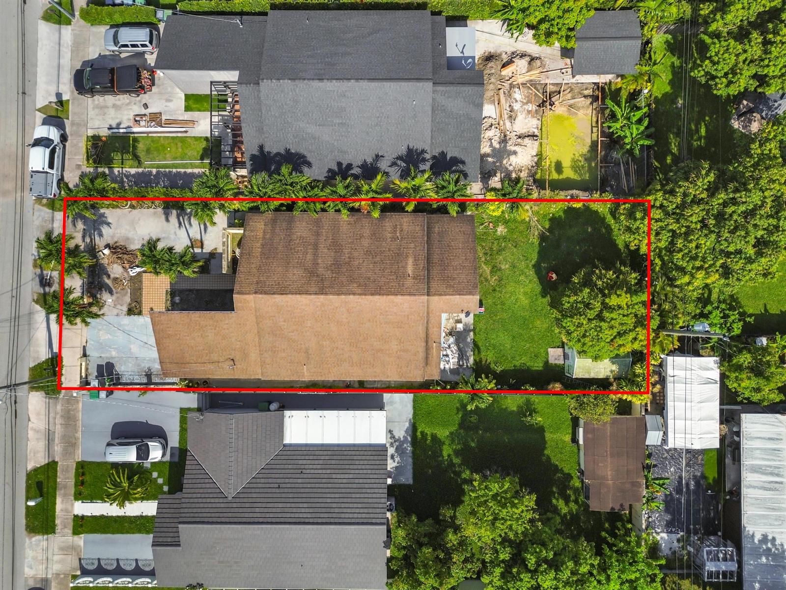 An aerial view shows a residential property with a brown roof and a large backyard — 7337 SW 21st Street, Miami FL 33155, MIAMI, FL