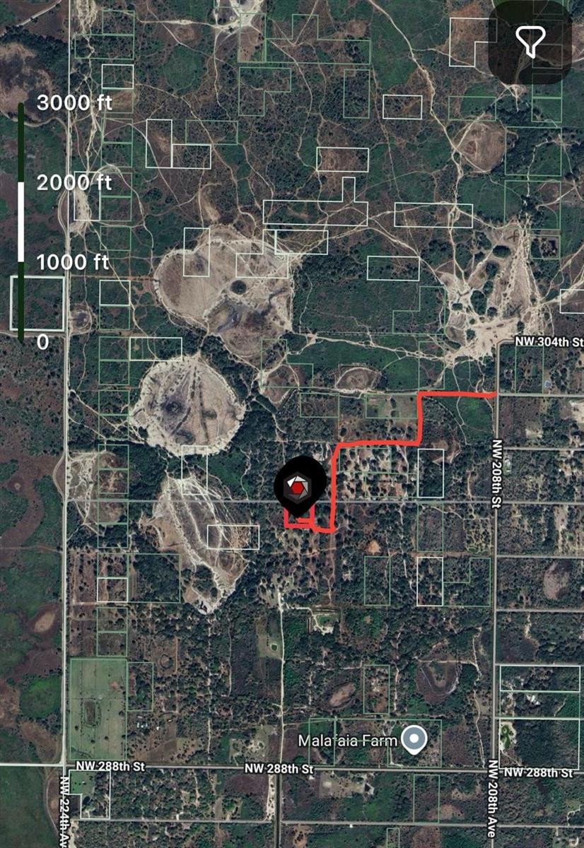 This is a satellite map showing a property boundary and surrounding terrain with a scale — 0 298th Street, Okeechobee FL 34972, OKEECHOBEE, FL