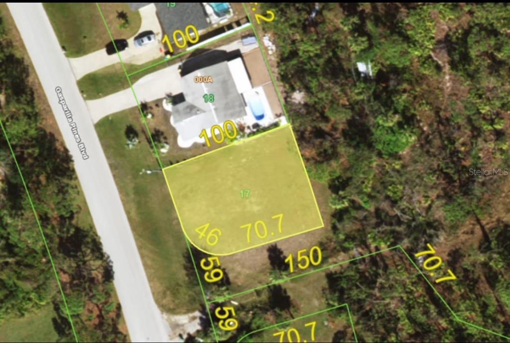This is an aerial map showing a highlighted vacant residential lot next to a house — 6657 GASPARILLA PINES BOULEVARD, ENGLEWOOD, FL