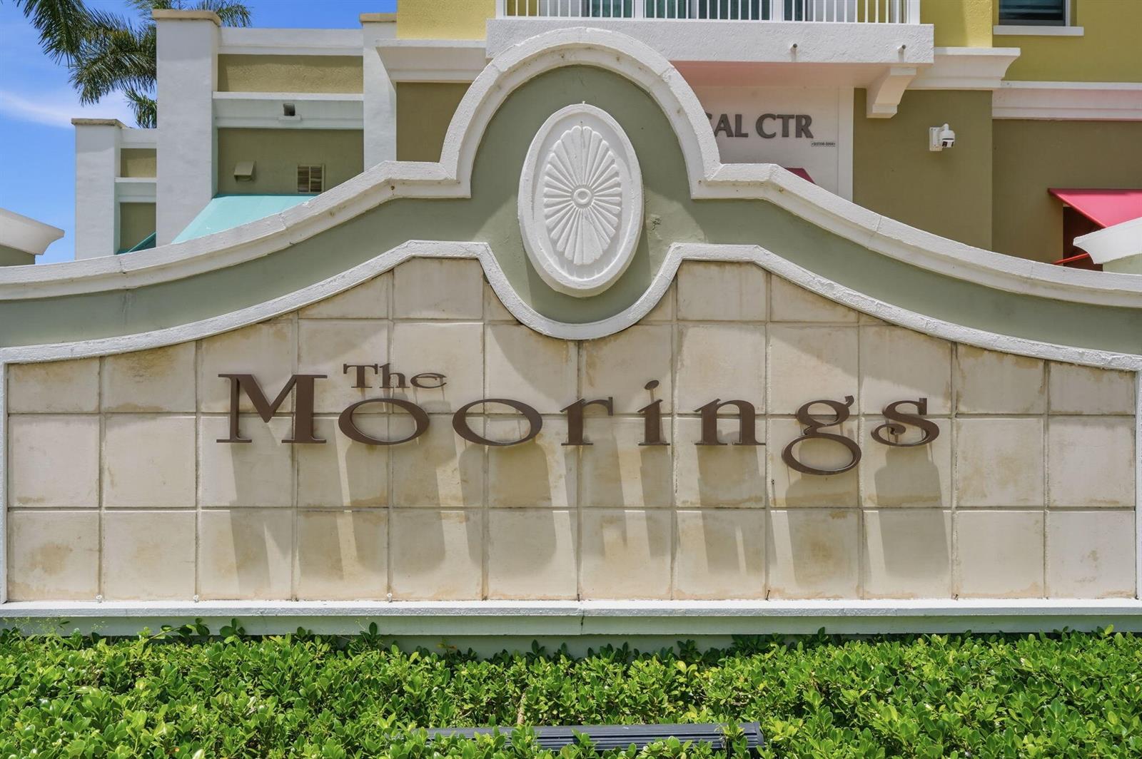 A sign for The Moorings stands in front of a multi-story building with green trim — 802 W Windward Way # 304, Lantana FL 33462, LANTANA, FL
