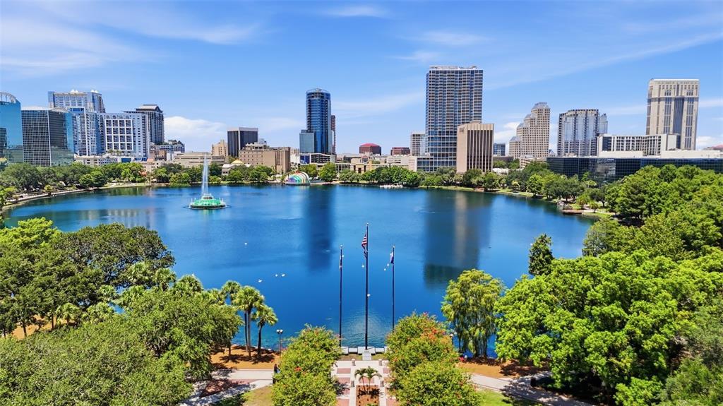An aerial view of Lake Eola Park in downtown Orlando with city skyscrapers in the background — 1 S EOLA DRIVE UNIT 13, ORLANDO, FL