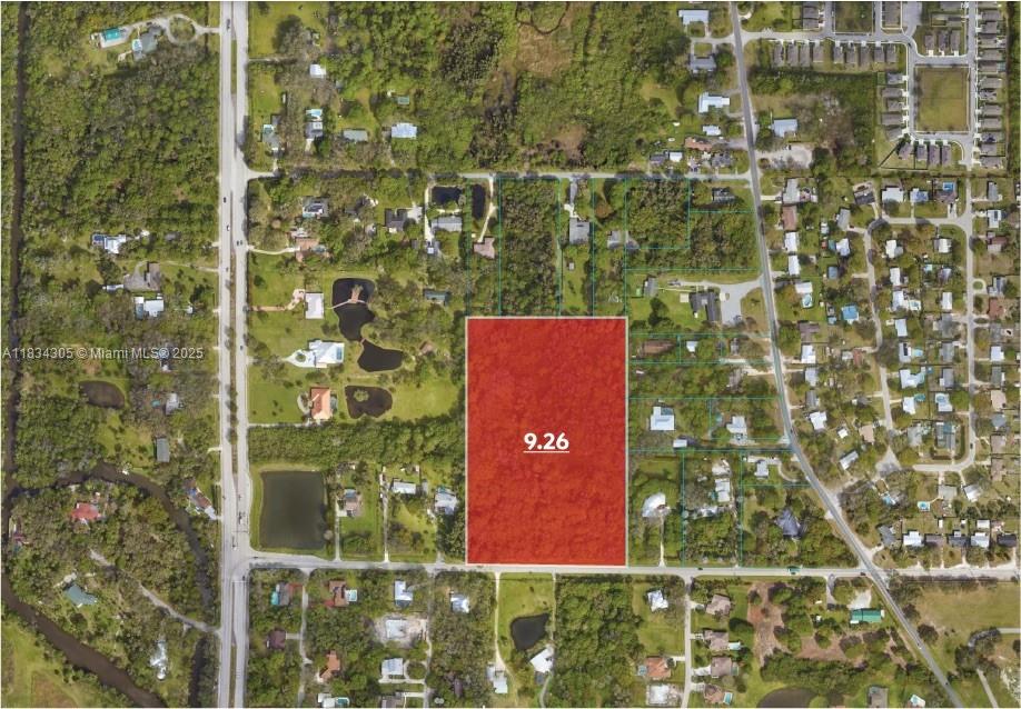 This is an aerial map showing a rectangular 9.26-acre parcel highlighted in red — 2140 Bell Ave, Fort Pierce FL 34982, FORT PIERCE, FL