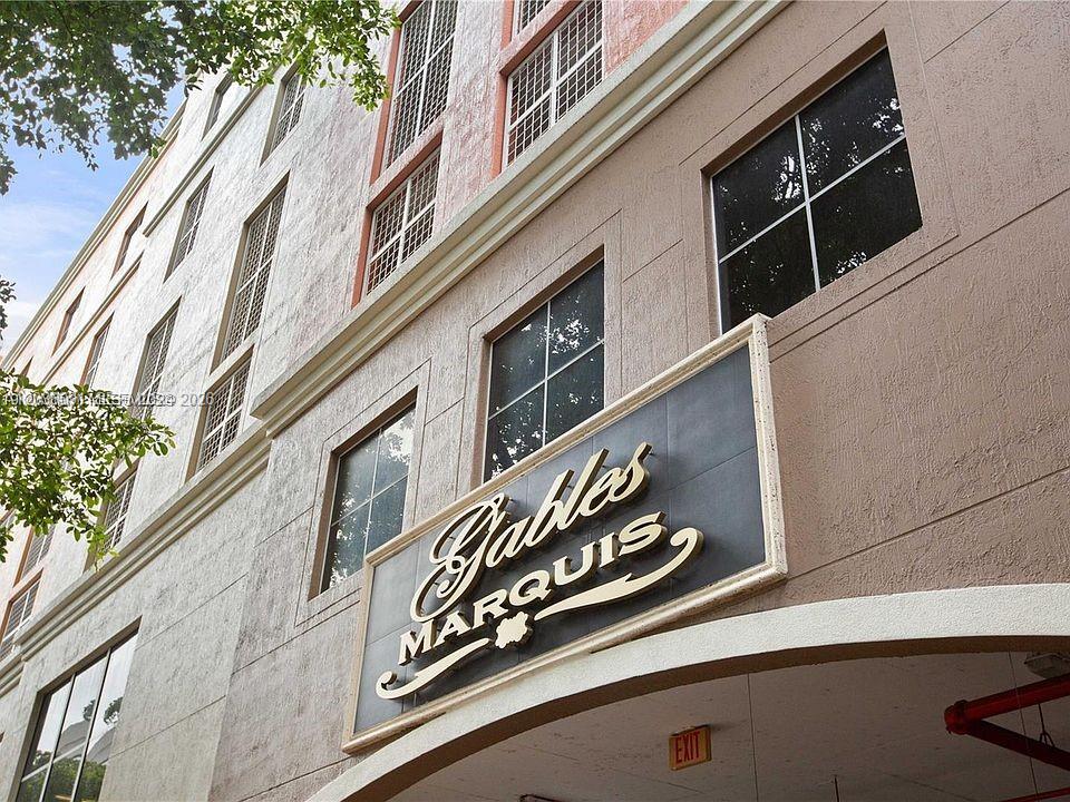 A low-angle exterior view of a multi-story building with a Gables Marquis sign — 3232 SW 22nd Ter # 1510, Miami FL 33145, MIAMI, FL