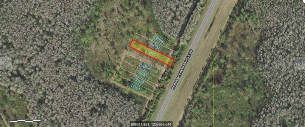 An aerial map shows a rectangular plot of land highlighted in red along a road — S KENANSVILLE ROAD, OKEECHOBEE, FL