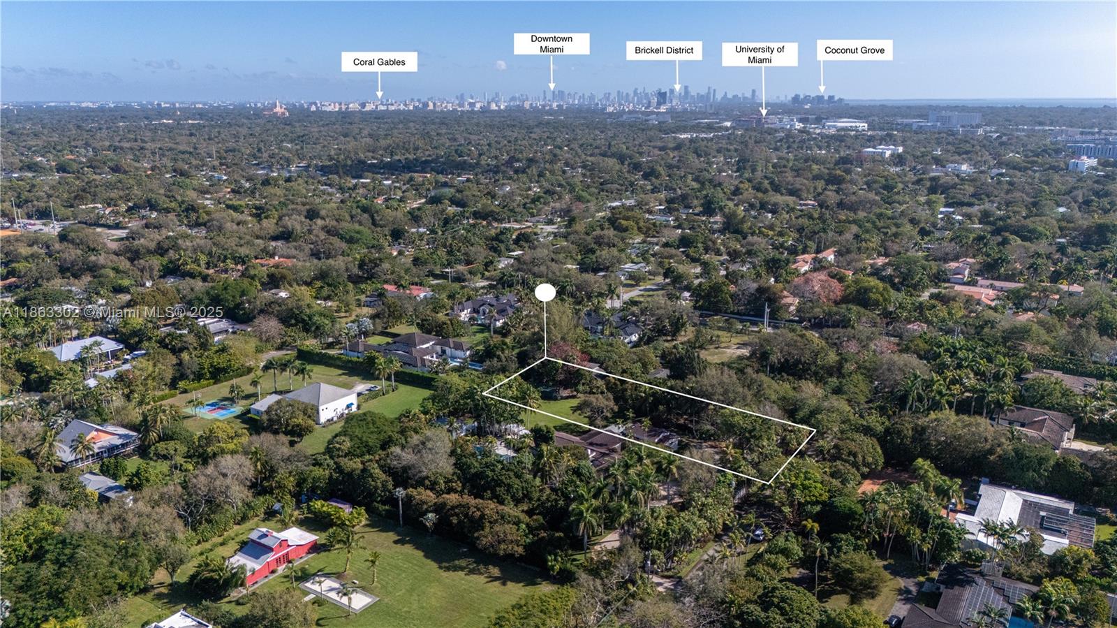 An aerial view shows a residential lot outlined in white amidst a lush, tree-filled neighborhood — 6767 SW 67th St, South Miami FL 33143, SOUTH MIAMI, FL