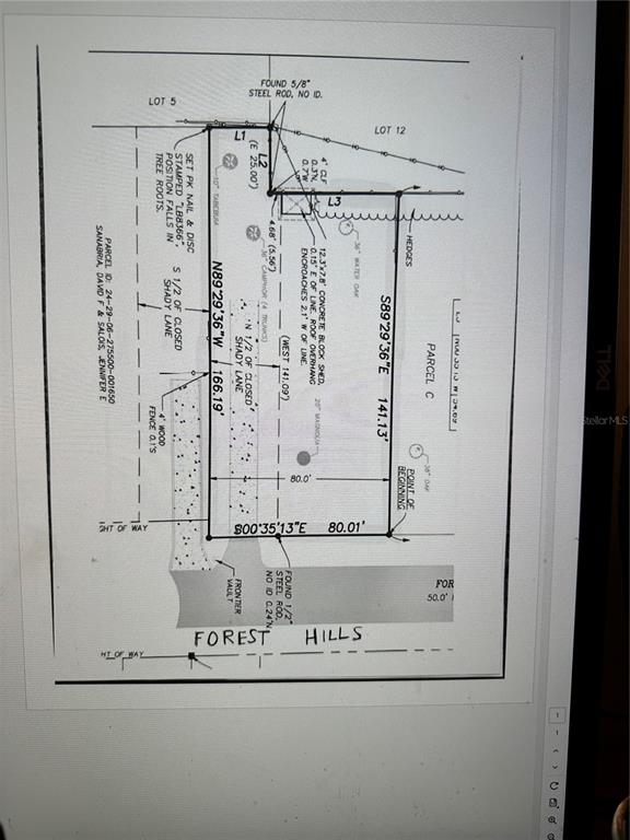 This is a land survey map showing property boundaries, structures, and easements for a residential lot — 4249 FOREST HILLS DRIVE, LAKELAND, FL