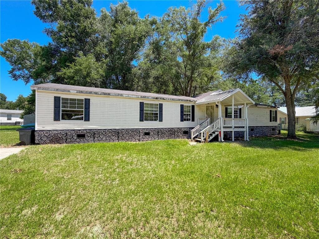 303 NW KENSINGTON LANE