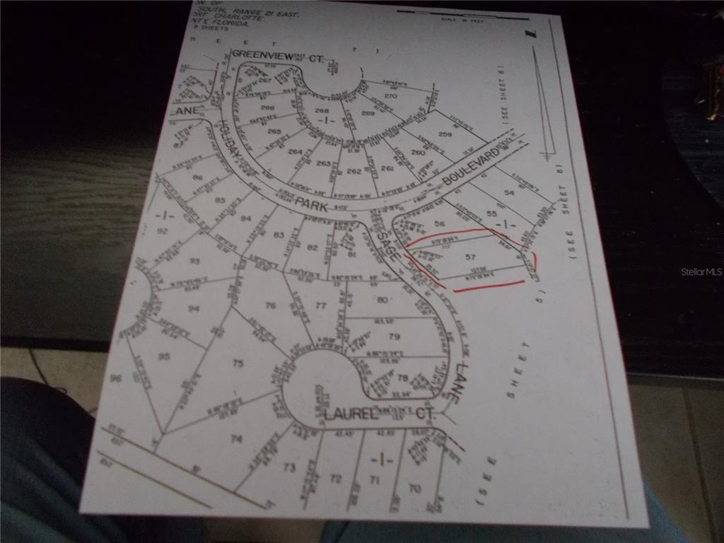 This image is a plat map showing property lot boundaries and street layouts — 6706 SAGE LANE, NORTH PORT, FL