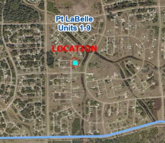This is an aerial map showing a highlighted property location within a residential subdivision — 7024 ALFA COURT, LABELLE, FL