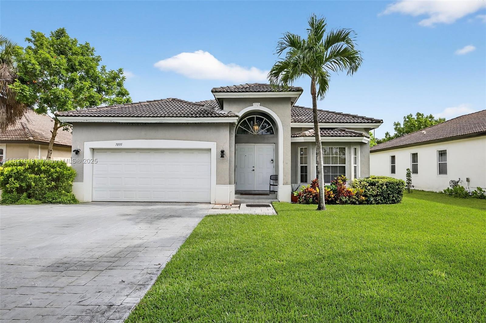 7095 E Tropical Way, Plantation FL 33317